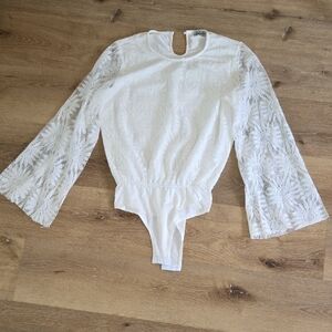 Elegant White Lace Bodysuit